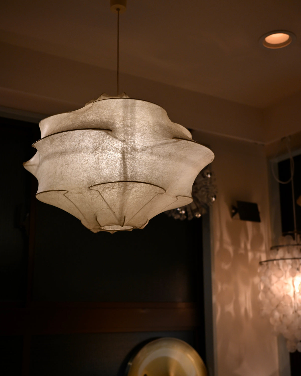 Italian Cocoon pendant lamp illuminated in interior