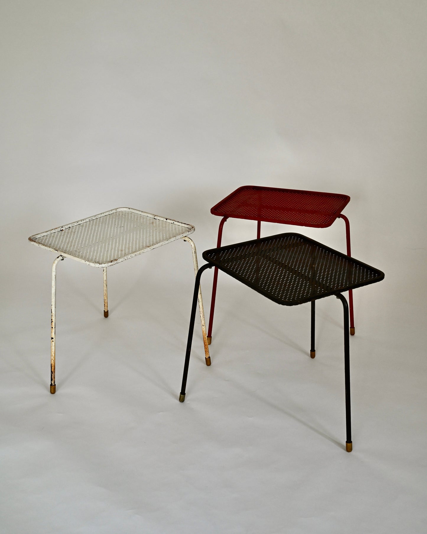 Mathieu Matégot Soumba tables, three-color set, France 1953