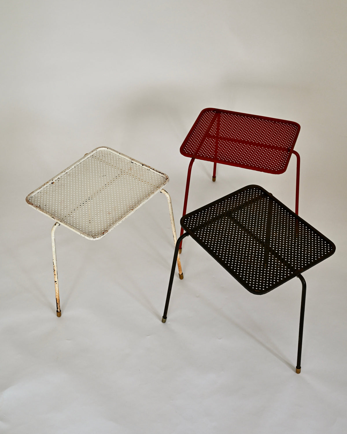 Mathieu Matégot Soumba tables, three-color set, France 1953